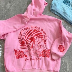 Pink Graphic Hoodie with Red Design